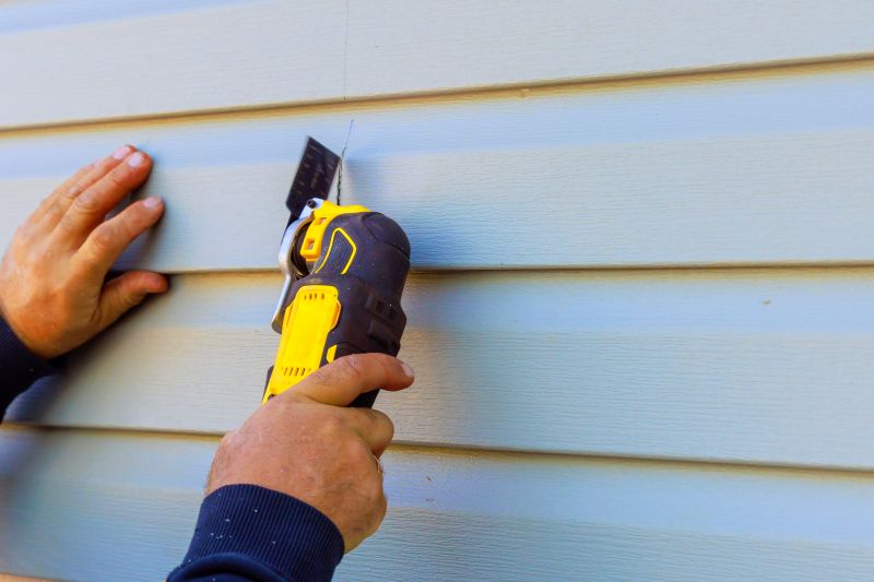 Vinyl siding repair installation