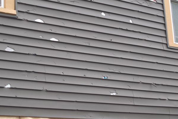 Damaged Siding Replacement in Carrollton